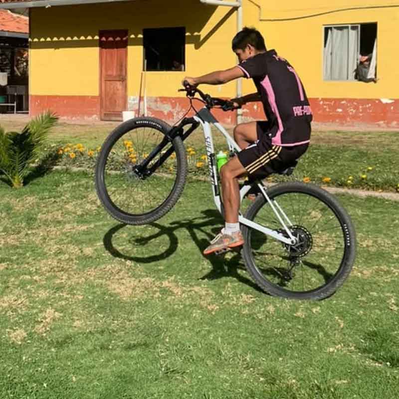 Peru Casa Girasoles cycling team Edwin winning more races and showing off his new bike with a wheelie.